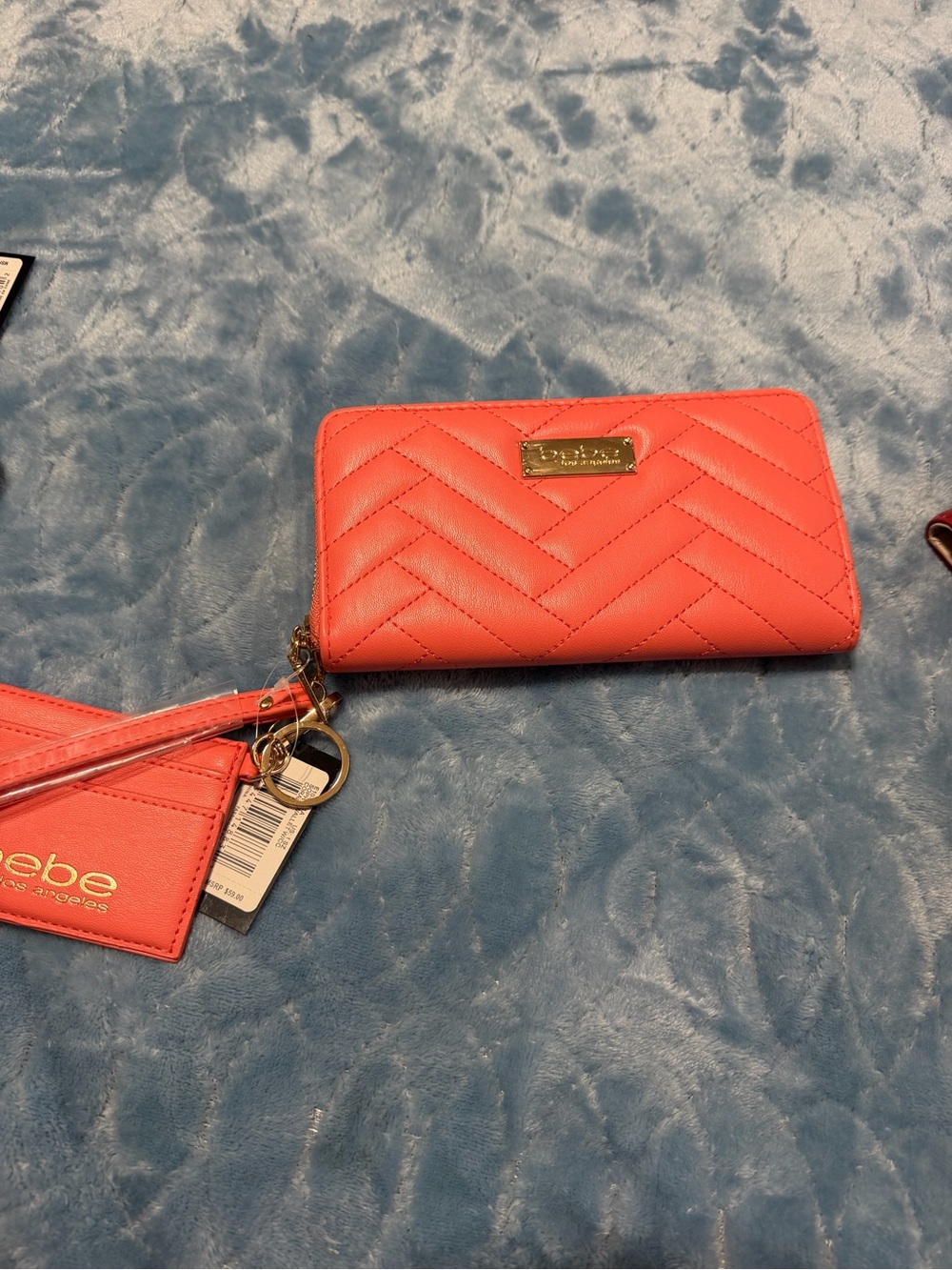 bebe Quilted Zip Wallet in Coral